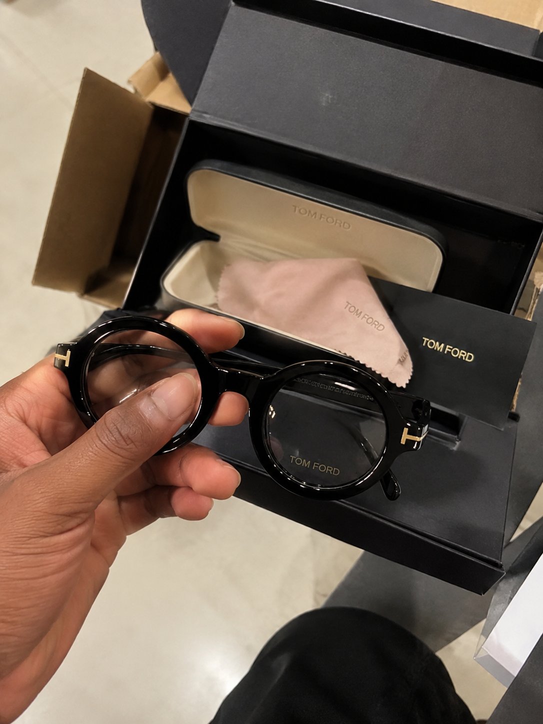 Customer wearing Tom Ford glasses